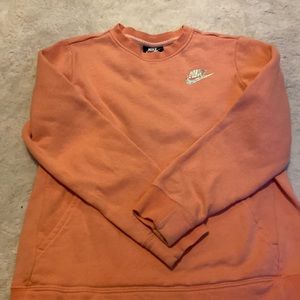 Pink Nike sweatshirt